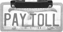 FasTrak External Transponder on a license plate that says Pay Toll